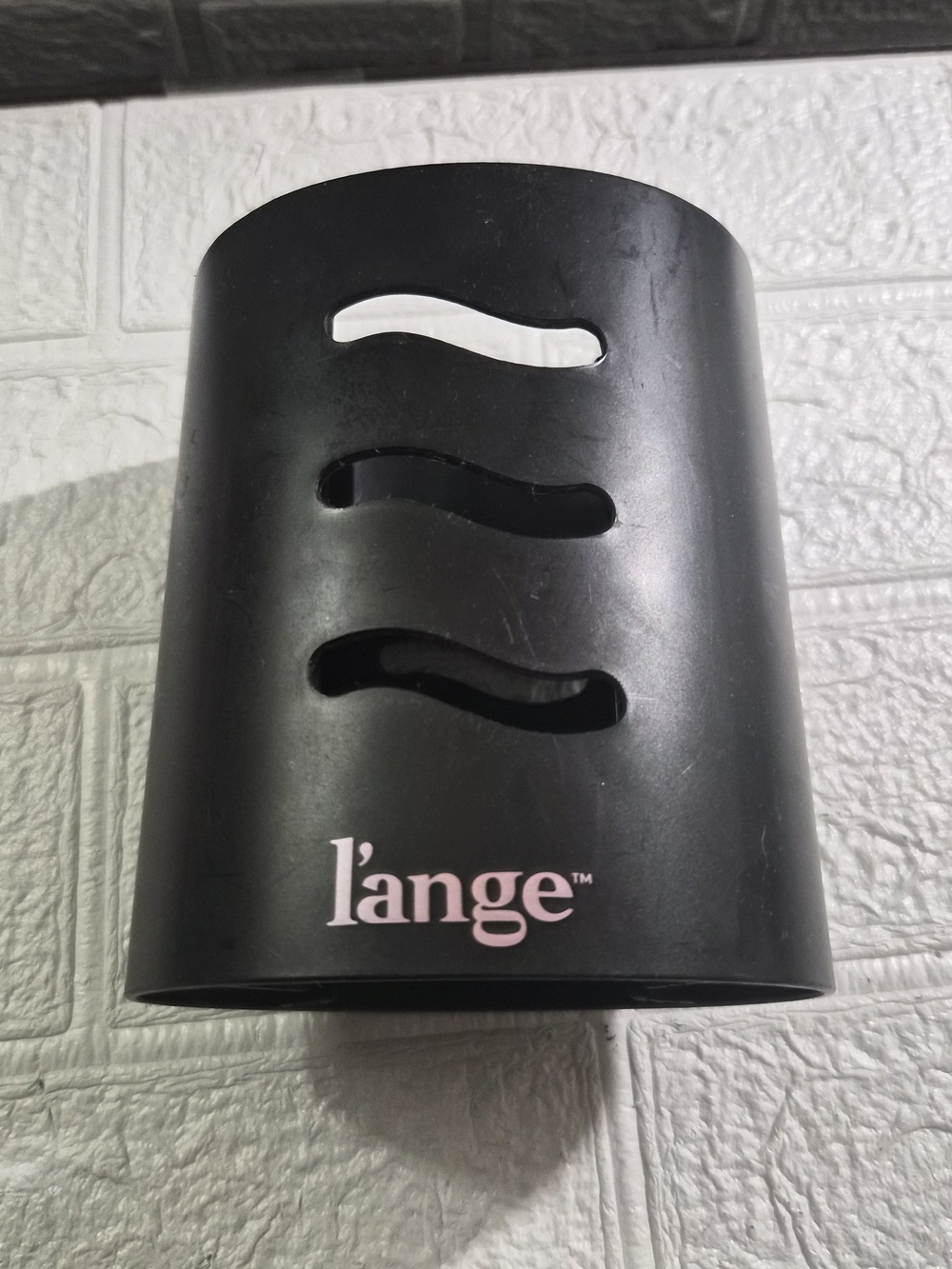 protective storage cap for a L'ange Hair 2-in-1 brush dryer.